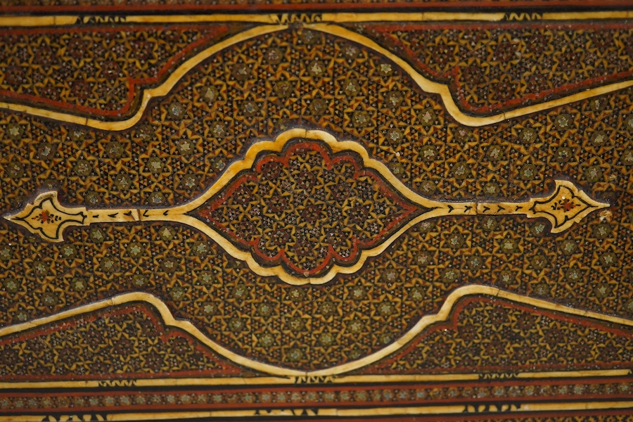 A 19th century Shiraz Eastern inlaid table cabinet, 36cm wide, 32cm high. Condition - damage to front corner edge of stringing, one side has small crack and top stringing one side missing.